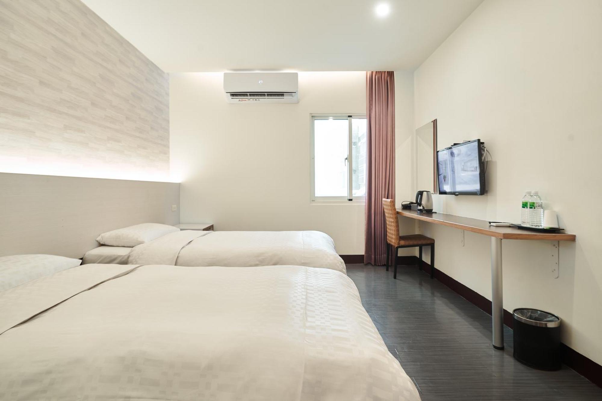 Yung An Business Hotel Dounan Exterior photo